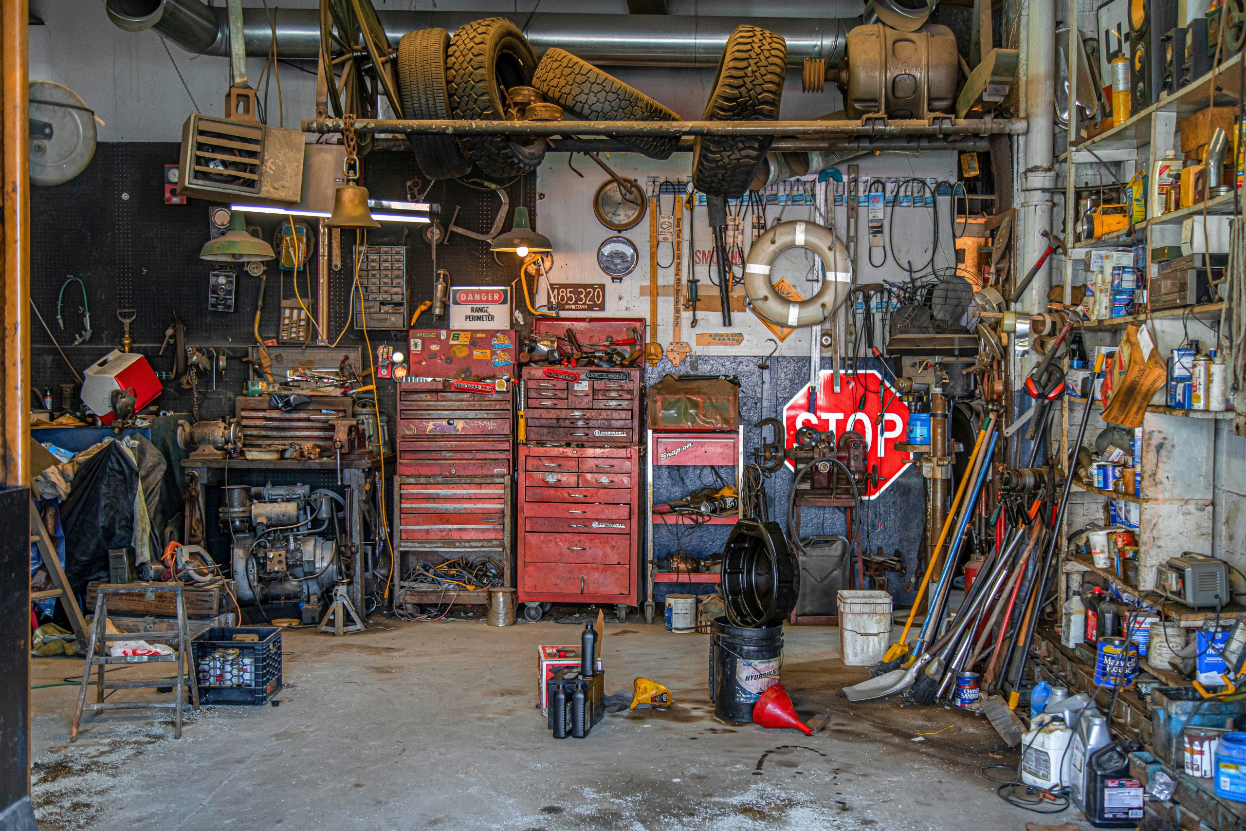 garage that is cluttered with too much stuff and looks messy